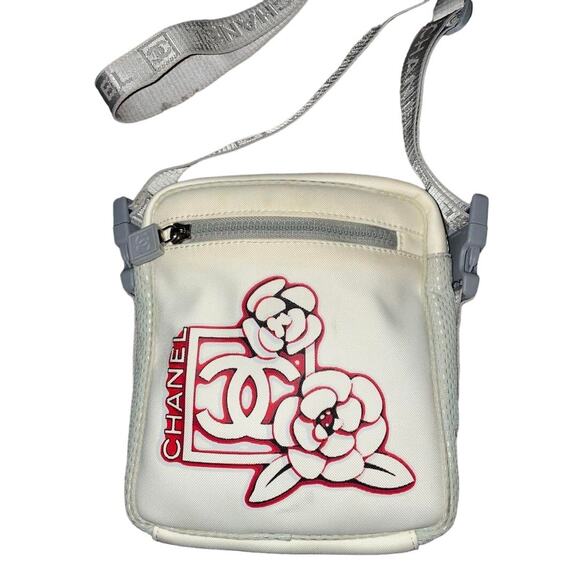 CHANEL Handbags - Authentic CHANEL CC Sports Line Crossbody Camellia Shoulder Bag Pochette White